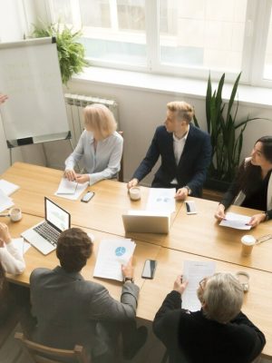 african-american-ceo-giving-presentation-corporate-team-meeting-concept_1163-4880